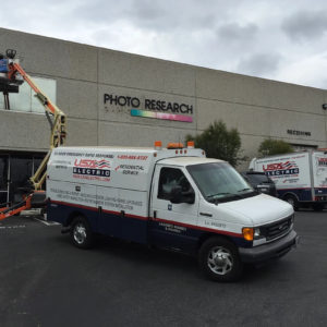 Service vans in a parking lot